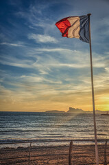 Floating French Flag on a Beach of La Ciotat at Sunset - 406861598