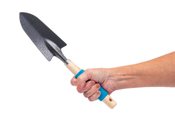 Older Woman’s Hand Holding Gardening Trowel