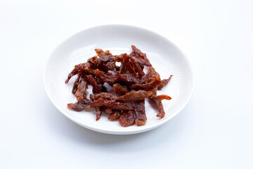 Deep fried sun-dried pork on white background.