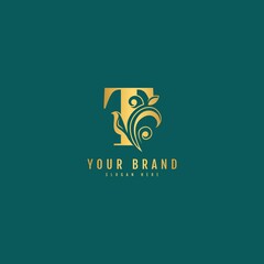 Initial letter T with leaf logo vector concept element. Luxury natural logotype vector.