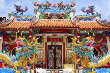 Chinese art shrine in Thailand. It is the worship of people in Chonburi, Thailand. Chinese sculpture Made of stone decorated inside the shrine area. Chinese dragon statue Chinese decoration According