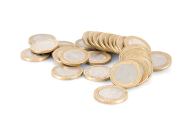 A pile of euro coins on a white background