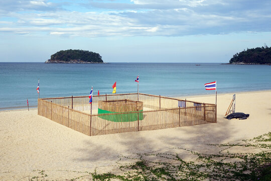 Protection And Surveilance Enclosure For Sea Turtle Eggs On The Beach. Leatherback Sea Turtle Eggs Nest Protection On Kata Beach, Phuket Thailand