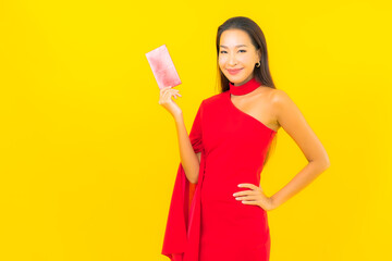 Portrait beautiful young asian woman with Red envelope letter