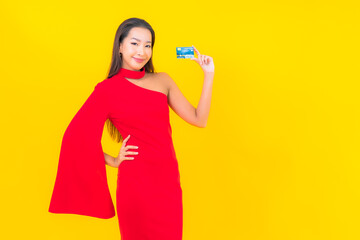 Portrait beautiful young asian woman with credit card