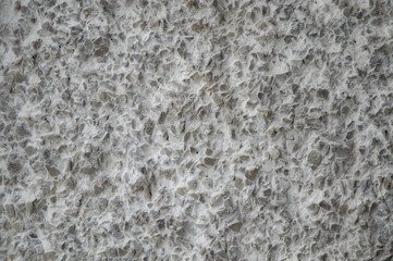 decorative coating with fine stone abrasive, light background