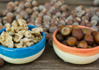 walnuts and hazelnuts, on wood natural light