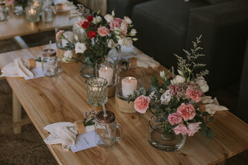 wooden table with glass cup with sherbet, cloth napkin with flowers and a letter that says: Thank you for sharing this night with me.