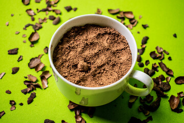 cocoa inside a white cup with green background
