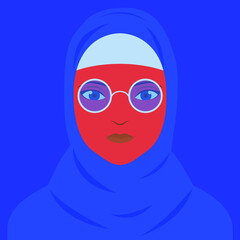 Muslim woman wearing hijab and eyeglasses standing alone in front of blue background.