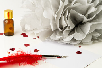 Preparing to write a valentine card with card and bracket