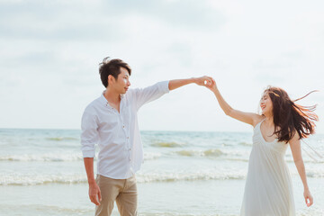 romantic time loving couple dance on the beach. Love travel concept. Honeymoon concept.
