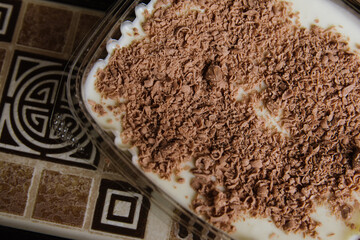 
delicious dessert of three milk with striped chocolate.