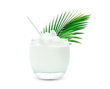 Coconut Smoothie in glass cup with green leaves pattern isolated on white background