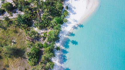 Aerial view of beautiful tropical island beach with emerald water at Koh Kood Thailand.