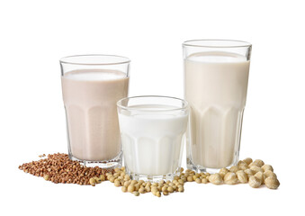 Glasses of different vegan milk on white background
