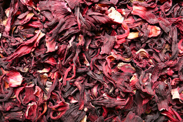 Dry hibiscus tea as background