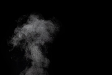 Figured smoke on a dark background. Abstract background, design element, for overlay on pictures.