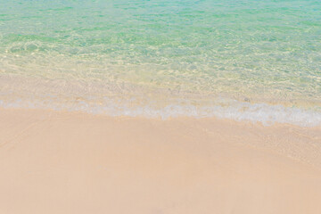 Fototapeta na wymiar Beautiful Soft Wave Of Blue Ocean On Sandy Beach For Background.