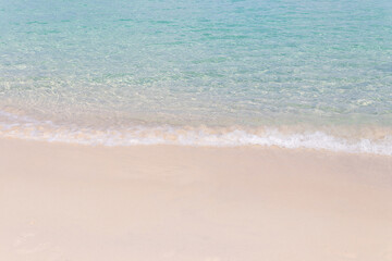 Fototapeta na wymiar Beautiful ocean wave on sandy beach for Background.