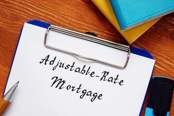 Financial concept about Adjustable-Rate Mortgage with sign on the sheet.