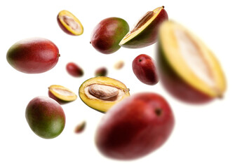 Mango whole and cut levitates on a white background