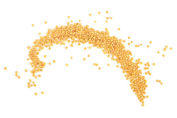 Organic yellow mustard seeds isolated on a white background, top view. Brassica alba.