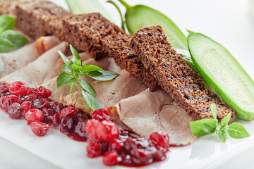 Beautifully decorated catering banquet table with different food snacks and appetizers