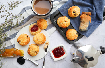 Scones with clotted cream and jam - Flat lay food on the marble background