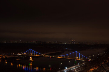 Fototapeta na wymiar Bright bridge at night