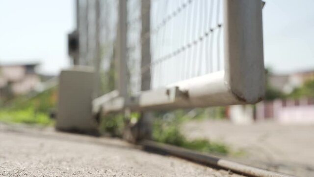 Automatic gate opener system with electric motor gear rack rail and stop sensor