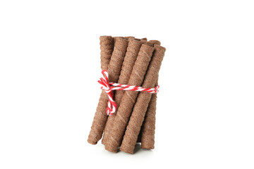Bunch of chocolate wafer rolls isolated on white background