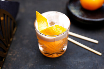 Orange cocktail. A refreshing fruit cocktail.
Sweet drink with orange. A refreshing fruit cocktail.