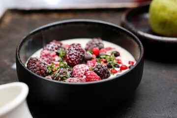 Fruit breakfast. Granola with fresh fruit. A bowl of milk and fresh fruit. A healthy nutritious breakfast.