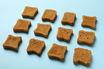 Flat lay with sandwich bread slices on blue background