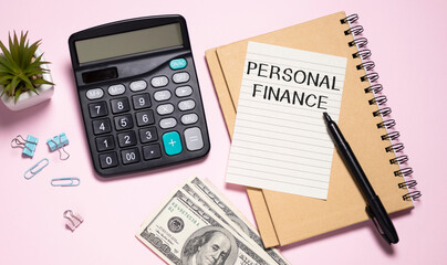 Card with text PERSONAL FINANCE. Calculator and pink background