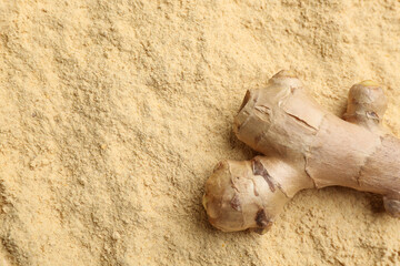 Raw root dry powdered ginger, top view. Space for text