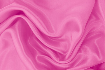 Light pink fabric texture background, detail of silk or linen pattern.