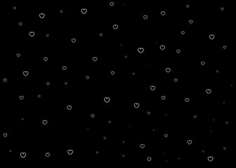 Small heart shapes on black background