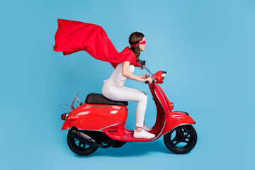 Full length profile photo of attractive hero lady drive moped wear white outfit red cloak mask...