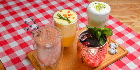 Drink milk menu various drink in different unique glasses. Hor drinks for cold autumn or winter weather, fall season.