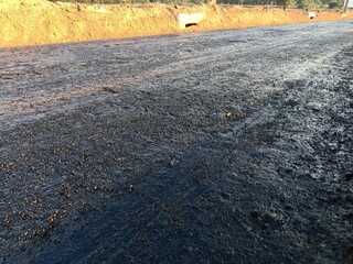 Rubber spraying for preparation of pavement In road construction