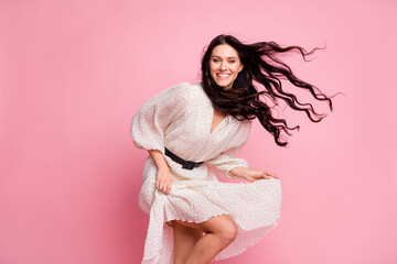 Photo portrait of girl wearing stylish summer dress dancing laughing isolated on pastel pink color...