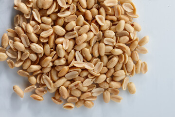 Pile of peanuts on a white background