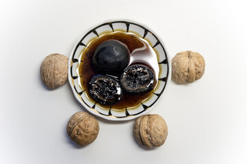 Jam walnuts and nuts in the shell, top view