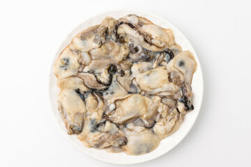 Raw oysters on a white background