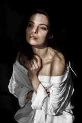 Sensual portrait of beautiful woman in sun light