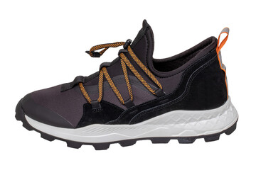 Mans black shoes. Close-up of a single of black sneaker or sport shoe isolated on a white background. Elegant and trendy mens footwear. Macro.