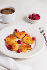 Breakfast on Valentine's Day - cheesecakes in the shape of hearts.