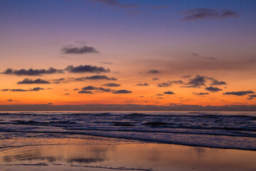 Fototapeta na wymiar North Sea at sunset. The tide.
